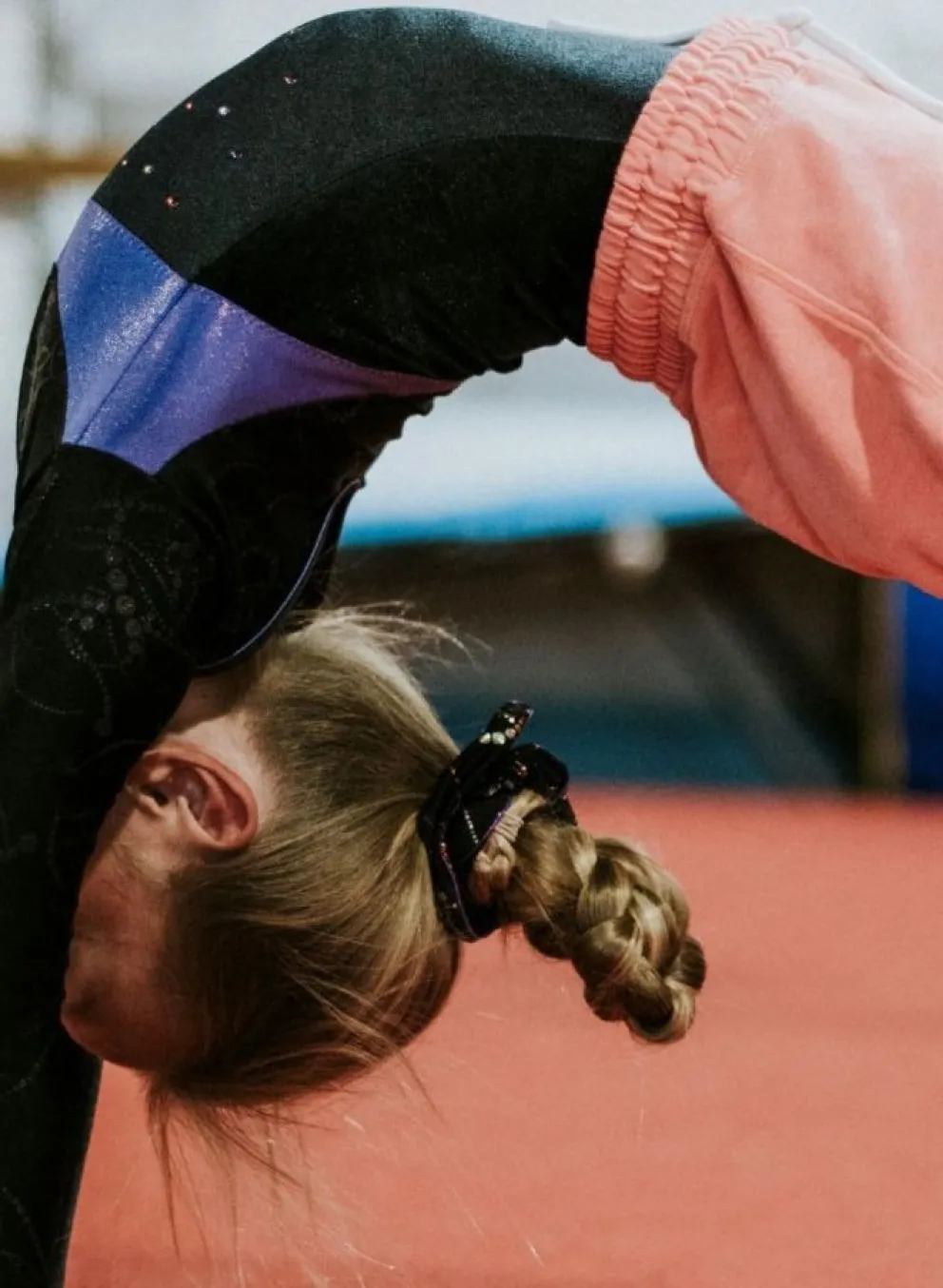 Young girl doing a backbend at the YMCA